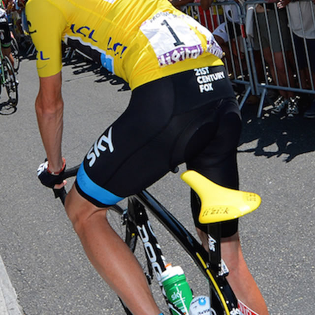 Tour de France cyclist with yellow fi'zi:k arione bike seat