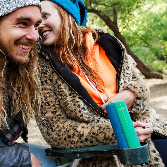 Blue UE Boom portable speaker in a cup holder