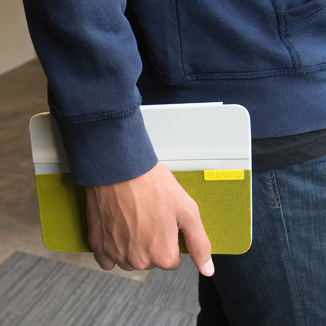 Yellow Logitech AnyAngle iPad case in hand