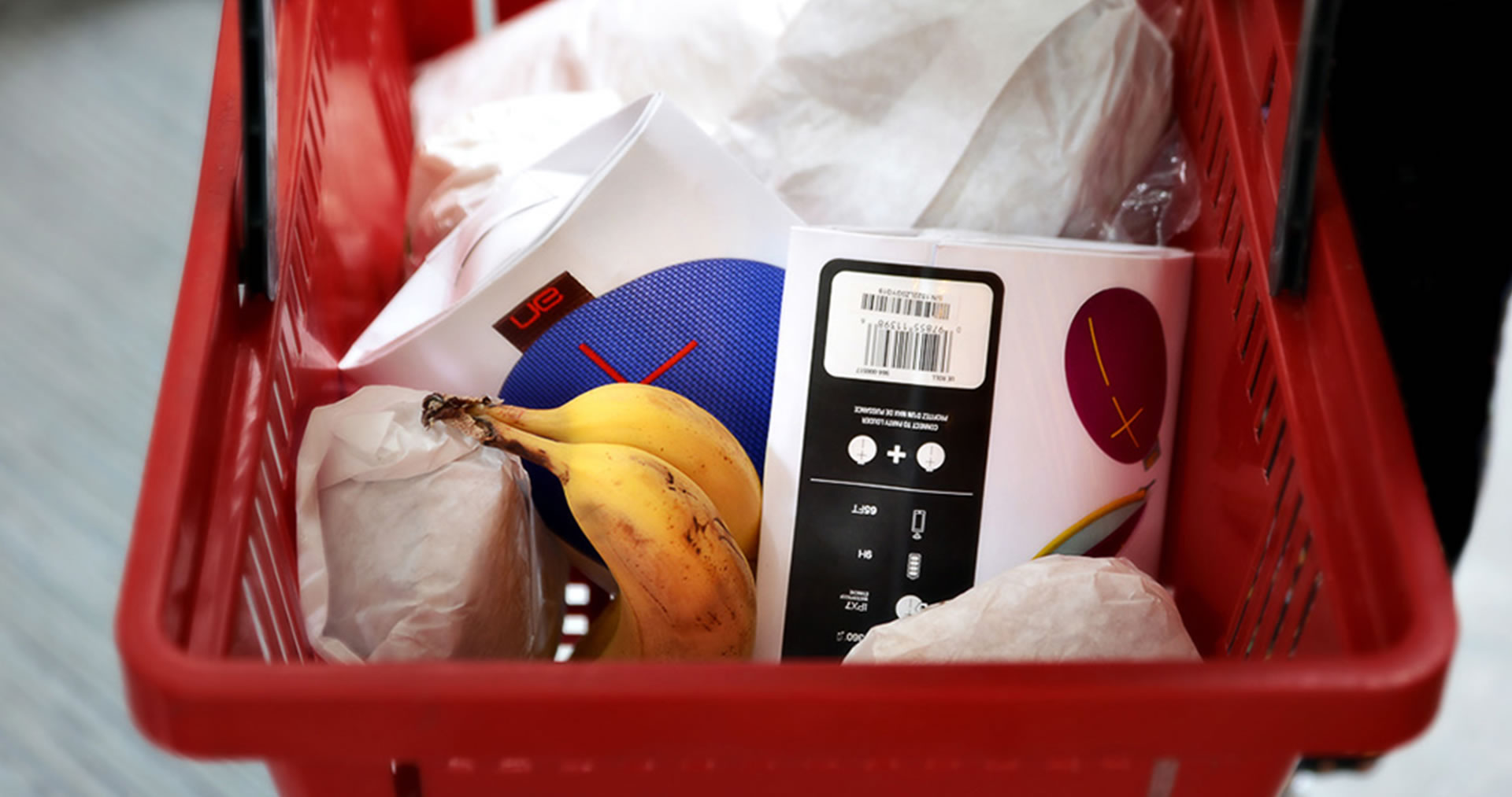 UE Roll portable speaker packaging in a shopping basket