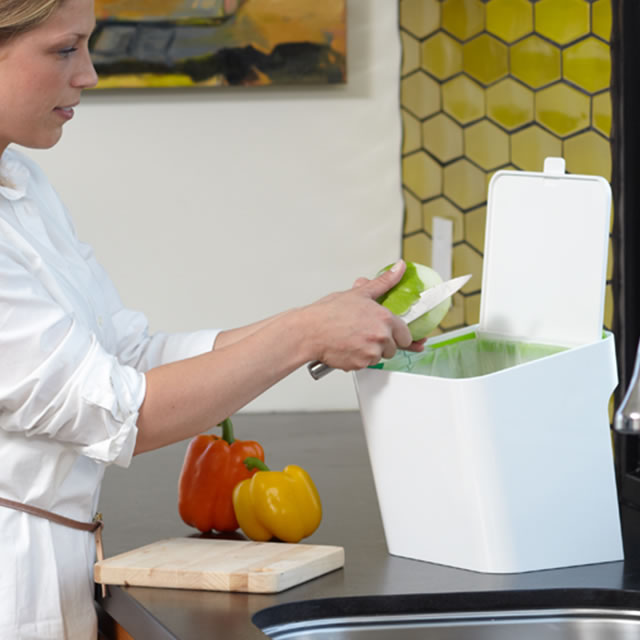 White Untrash composting can in the kitchen