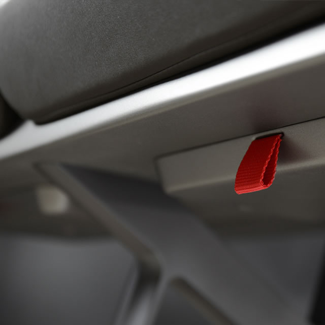 AirCom Pacific airplane seat pull tab design
